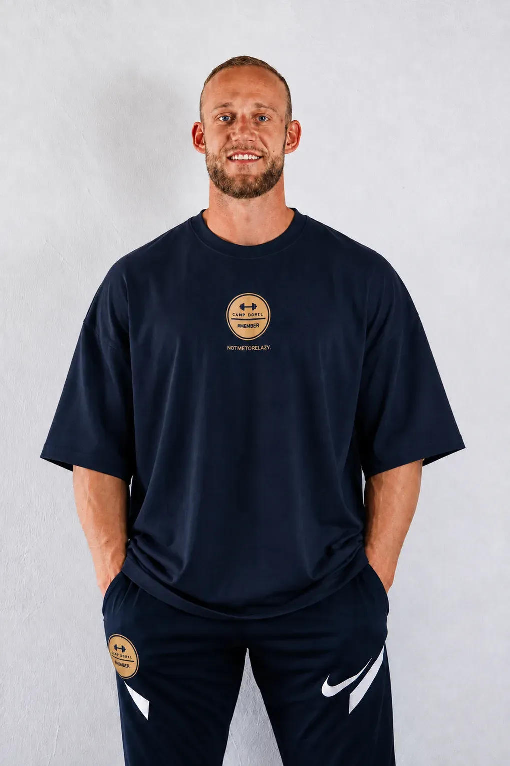 Camp Dörfl shirt in navy, oversized cut, with a gold #MEMBER emblem