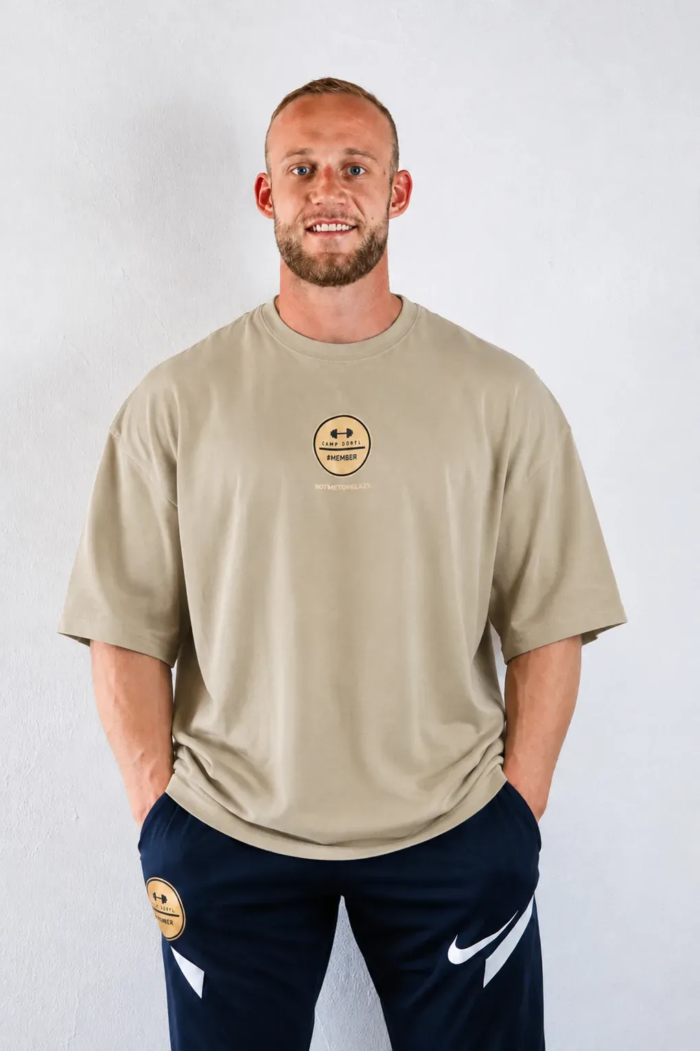 Camp Dörfl shirt in sand, oversized cut, with a gold #MEMBER emblem