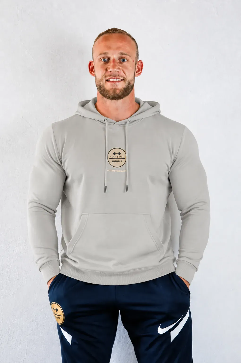 Camp Dörfl hooded sweatshirt in grey with a gold #MEMBER emblem
